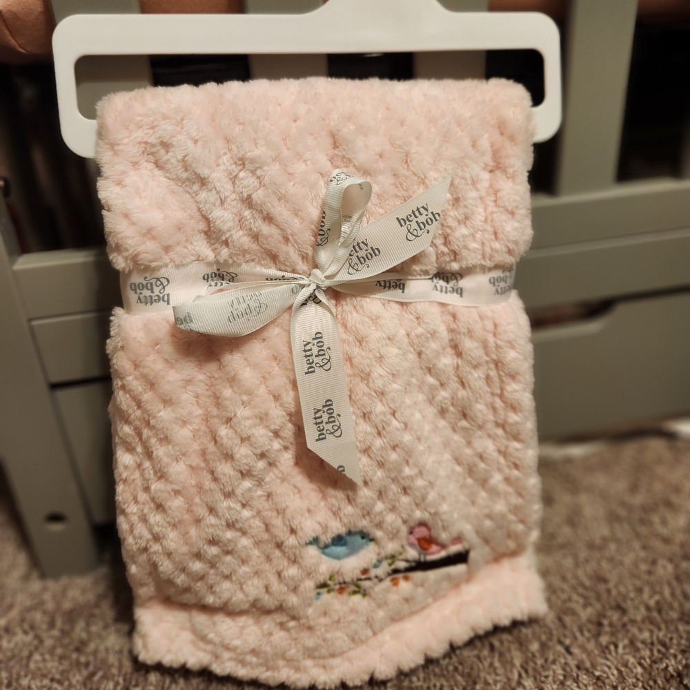Charming Pink Bib with Lace Texture and Bow